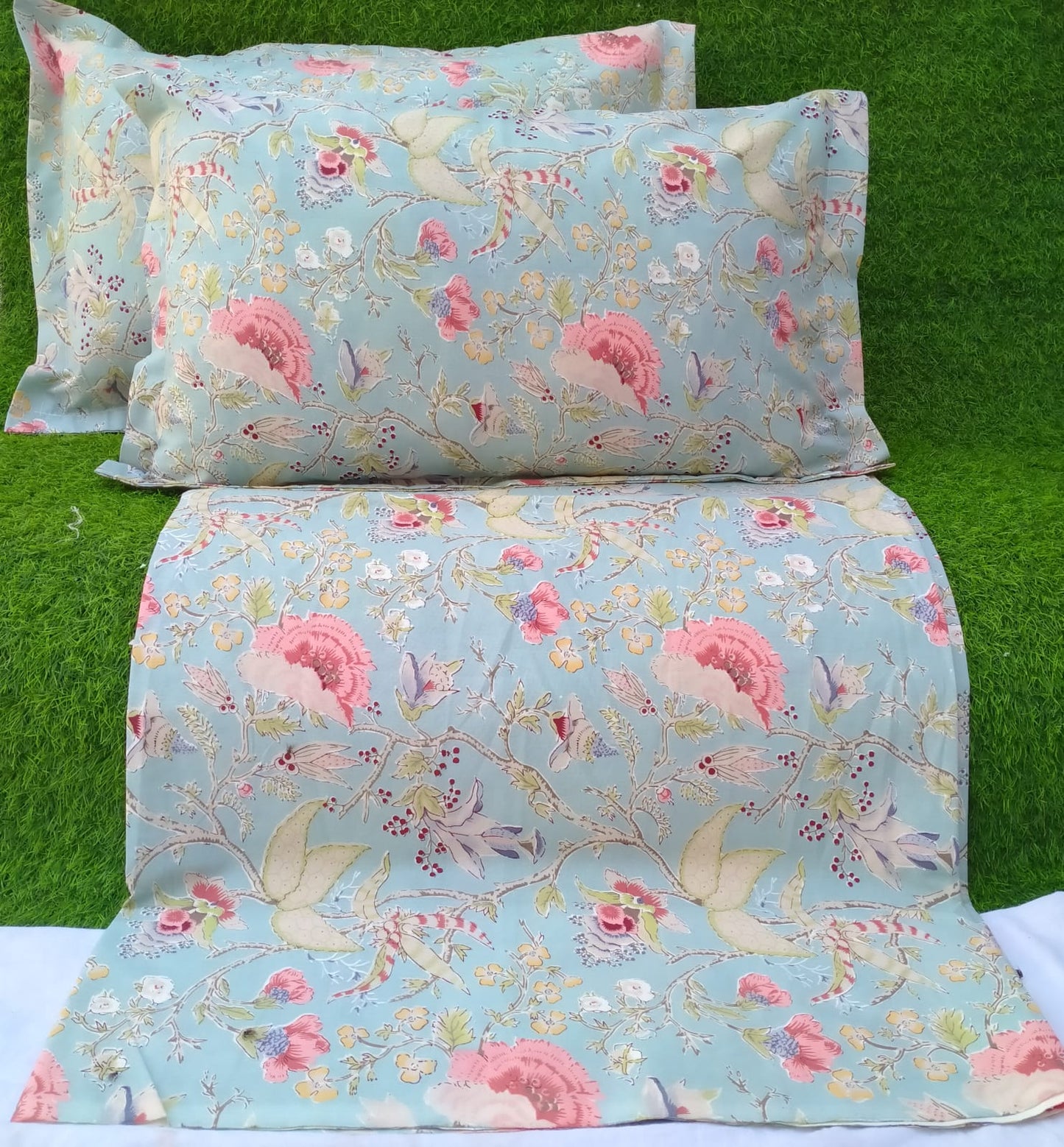 Pink and Yellow Flowers on Blue Bedsheet and 2 Pillow Covers